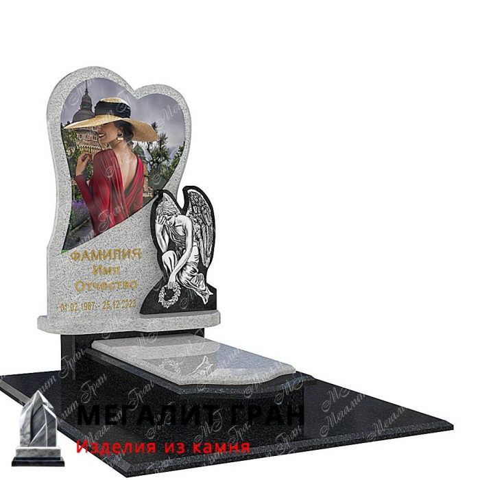 гранитный памятник в форме сердца с ангклом