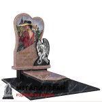 гранитный памятник в форме сердца с ангелом